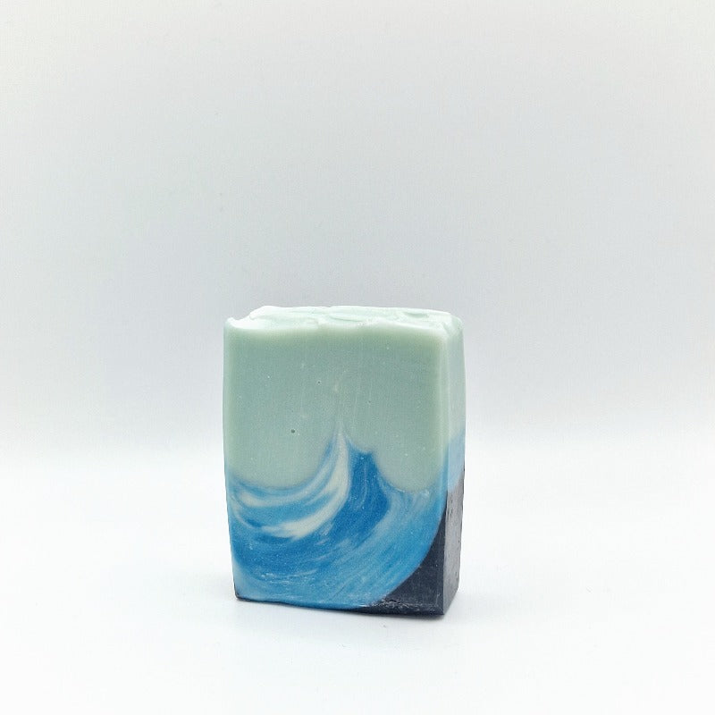 Handmade soap with a blue wave inspired by the black beach in iceland